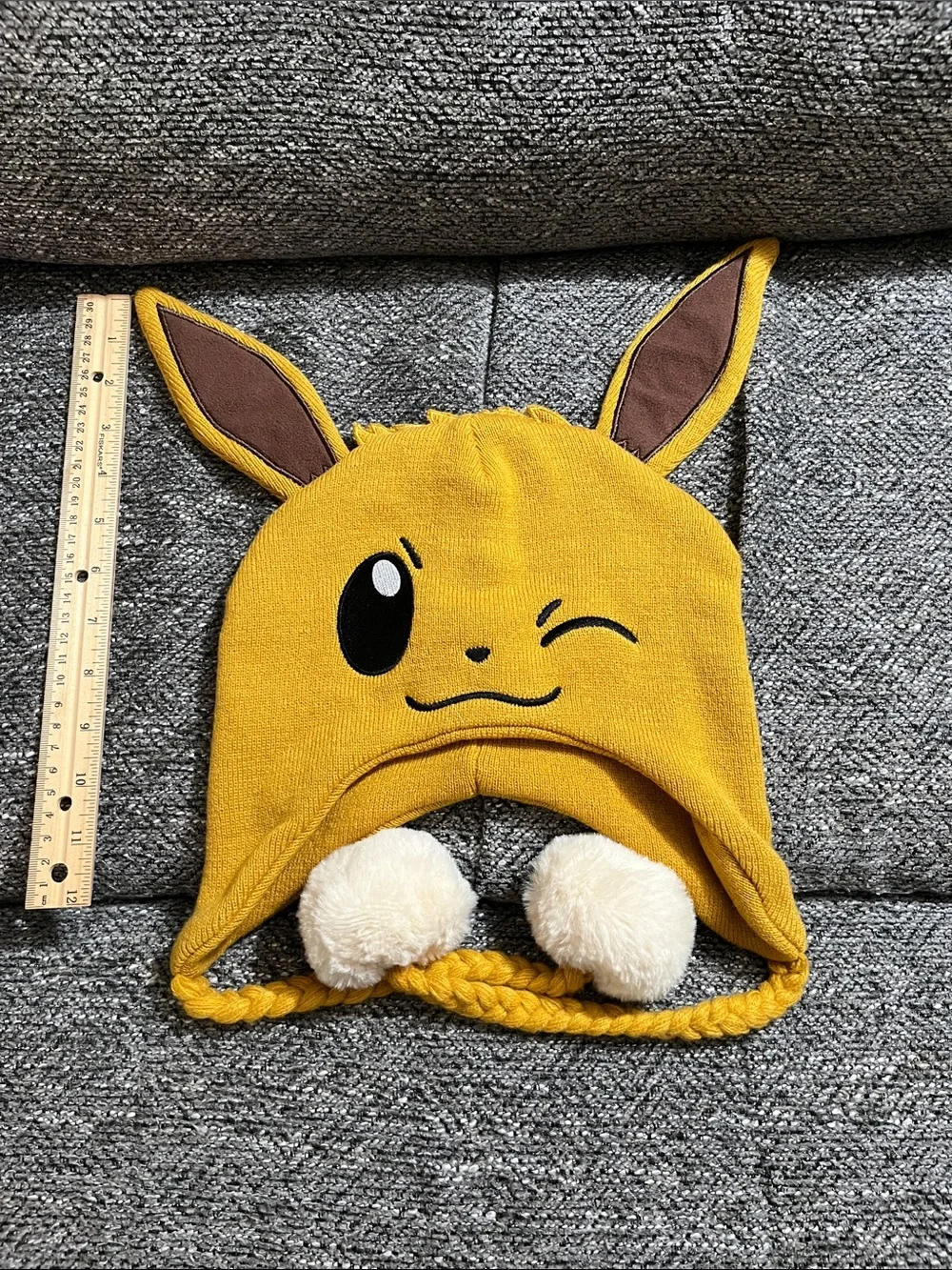 Pokemon Winking Eevee with Ears Beanie Hat with Pom-Pom Tassels